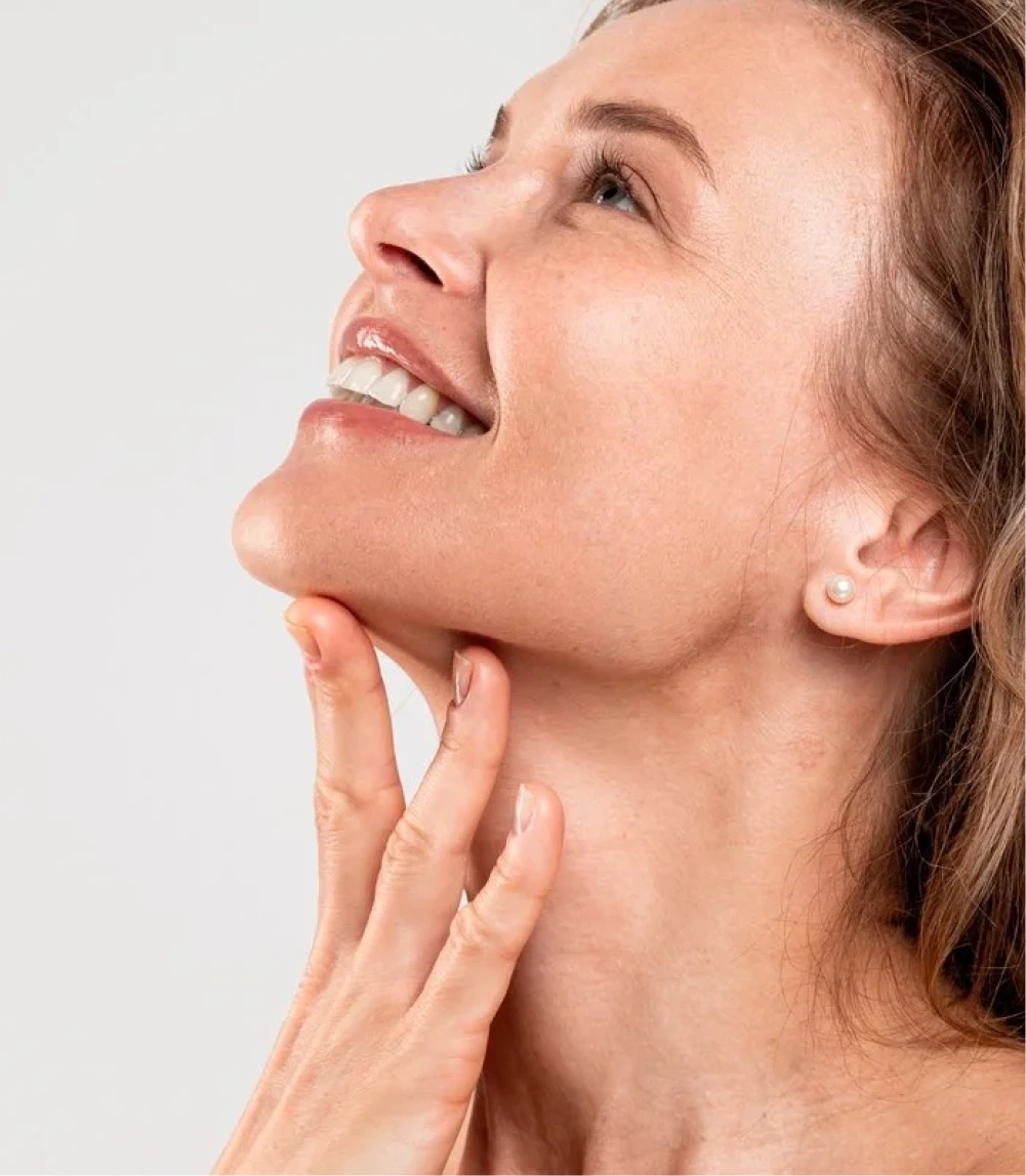 Woman's profile showing defined jawline and contoured chin area